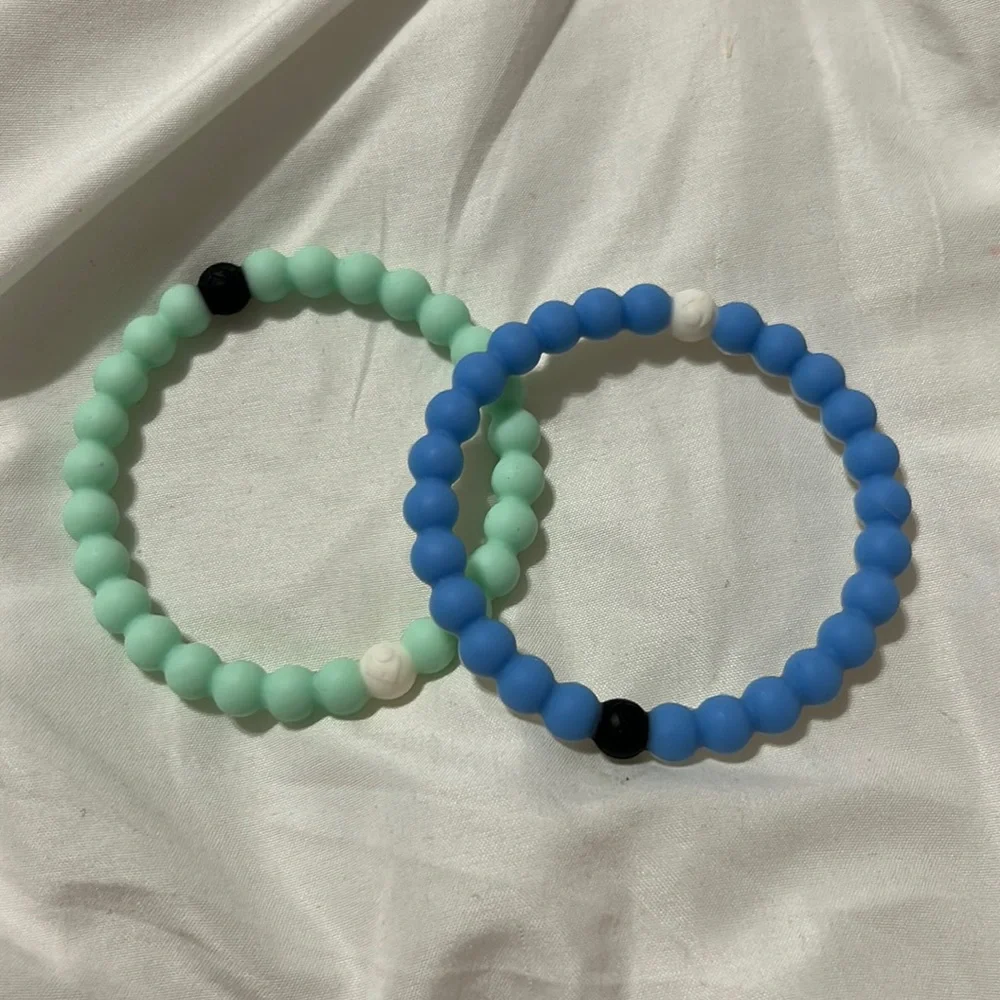 2 Lokai Bracelets